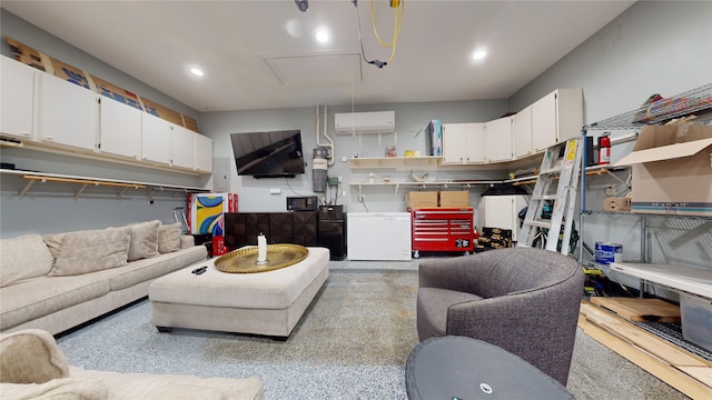 living room featuring a wall unit AC