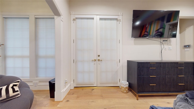 living room with light hardwood / wood-style flooring