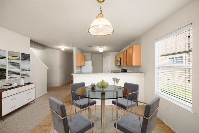 view of tiled dining room