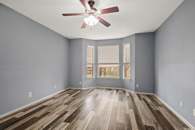 unfurnished room featuring wood-type flooring and ceiling fan