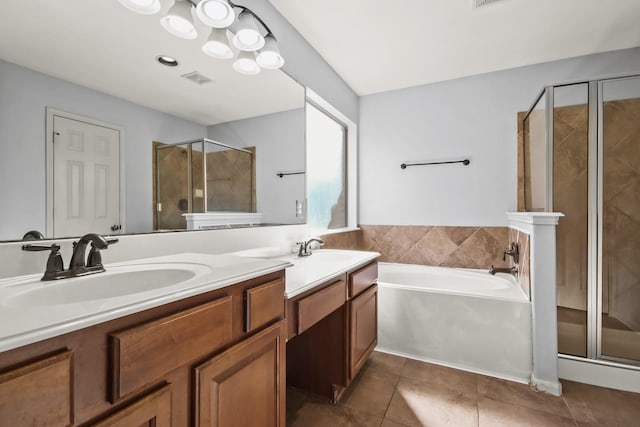 bathroom featuring tile patterned flooring, vanity, and independent shower and bath