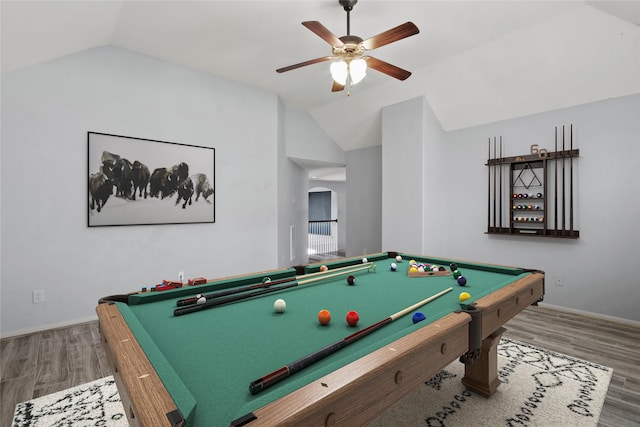 game room with hardwood / wood-style flooring, lofted ceiling, and pool table