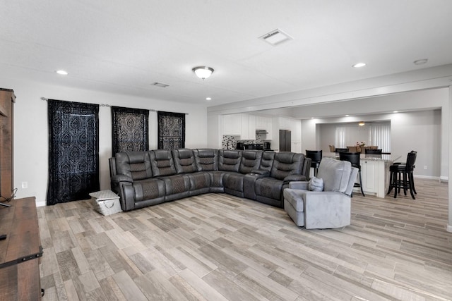 living room featuring light wood-type flooring