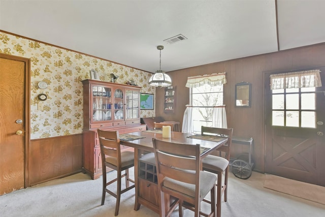 view of carpeted dining space