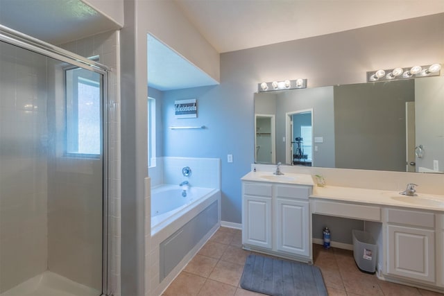 bathroom featuring tile patterned floors, separate shower and tub, and vanity