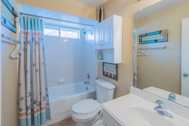 full bathroom featuring tile patterned flooring, shower / tub combo, vanity, and toilet