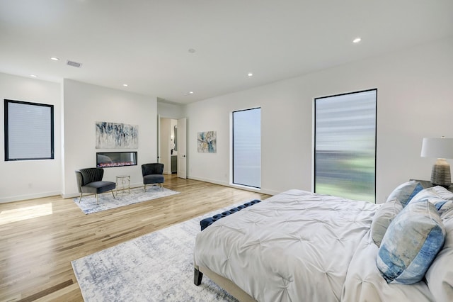 bedroom featuring light hardwood / wood-style flooring