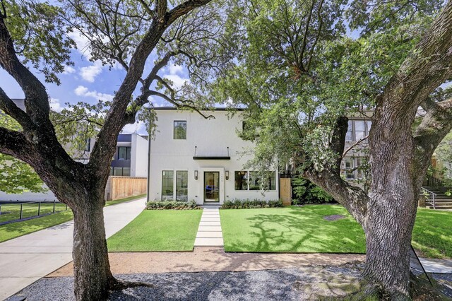 view of front of property with a front lawn