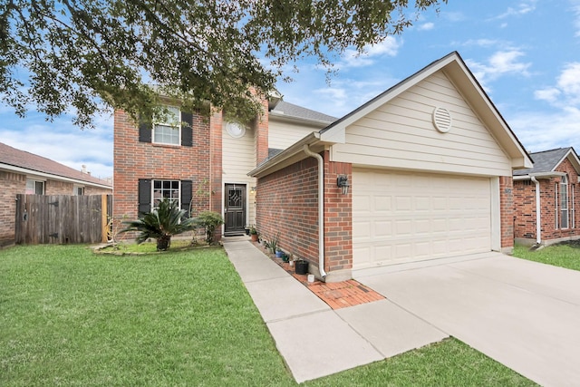 view of front of home with a front yard and a garage