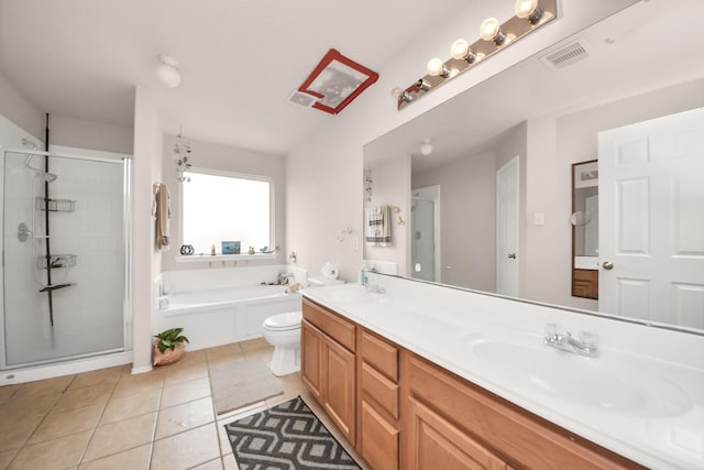 full bathroom featuring tile patterned floors, vanity, independent shower and bath, and toilet