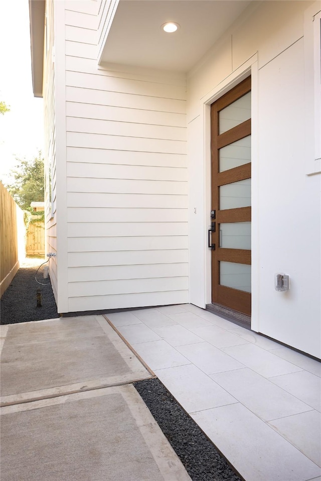 doorway to property with a patio area