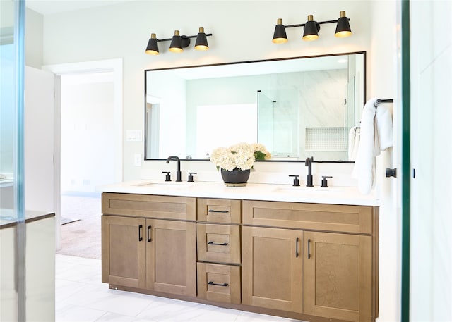 bathroom with tile patterned floors, vanity, and an enclosed shower