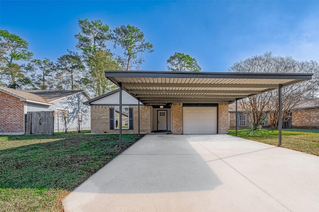 view of front of house featuring a front lawn, a garage, and a carport