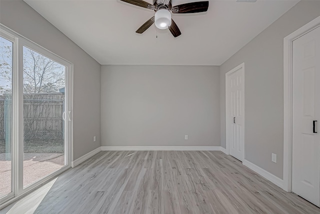 unfurnished room with ceiling fan and light hardwood / wood-style flooring