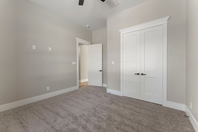 unfurnished bedroom with carpet and ceiling fan