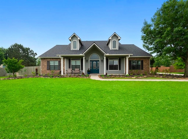 view of front facade featuring a front yard