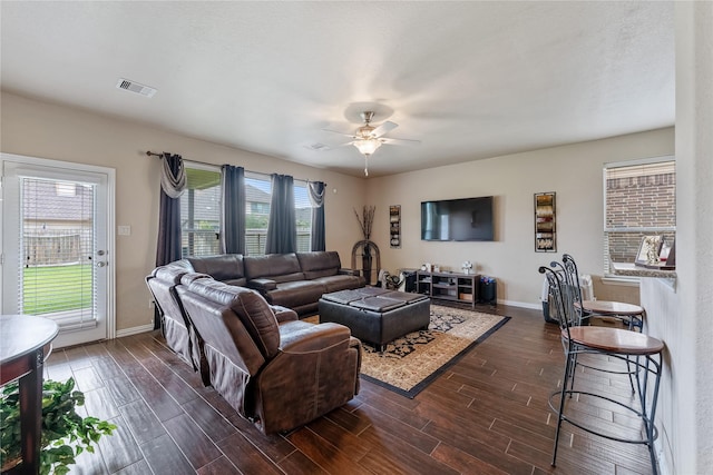 living room featuring ceiling fan