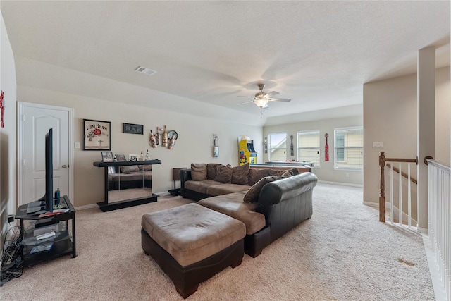 living room with light colored carpet, ceiling fan, and pool table