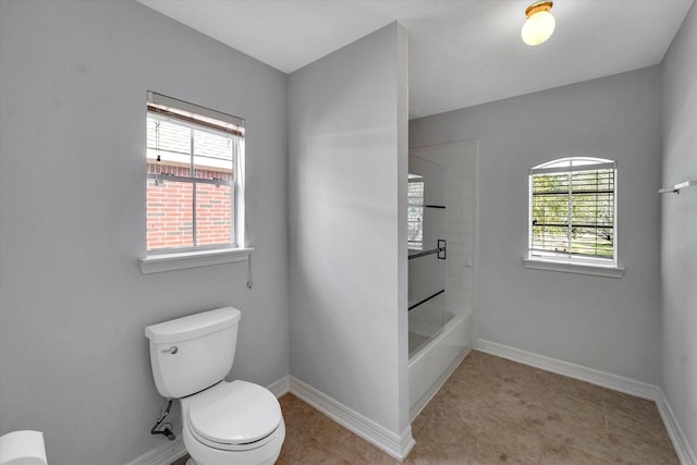 bathroom with toilet and shower / tub combination