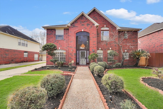 view of front property featuring a front yard