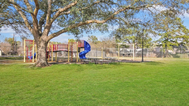 view of jungle gym with a lawn