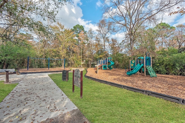 view of playground with a yard