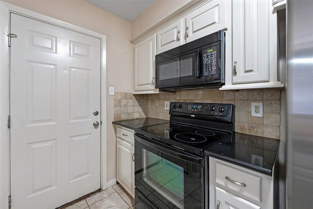 kitchen with tasteful backsplash, white cabinetry, light tile patterned flooring, and black appliances