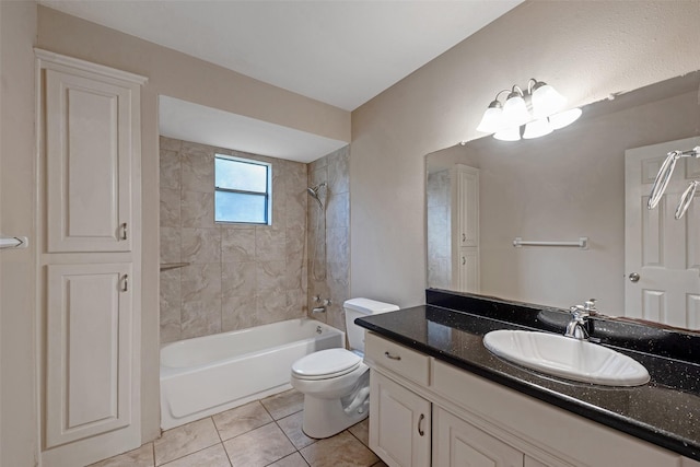 full bathroom with tile patterned flooring, vanity, toilet, and tiled shower / bath