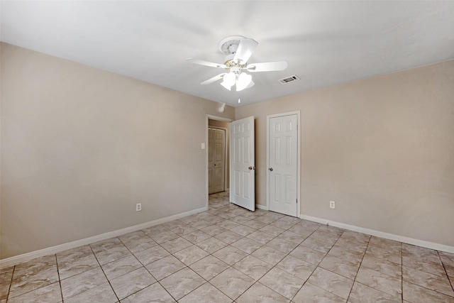 spare room featuring ceiling fan