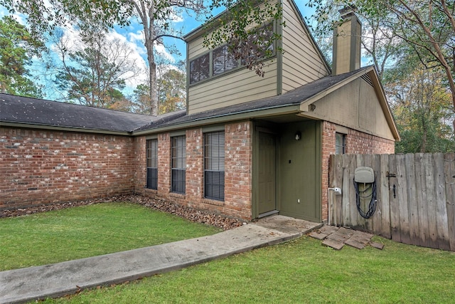 exterior space featuring a lawn