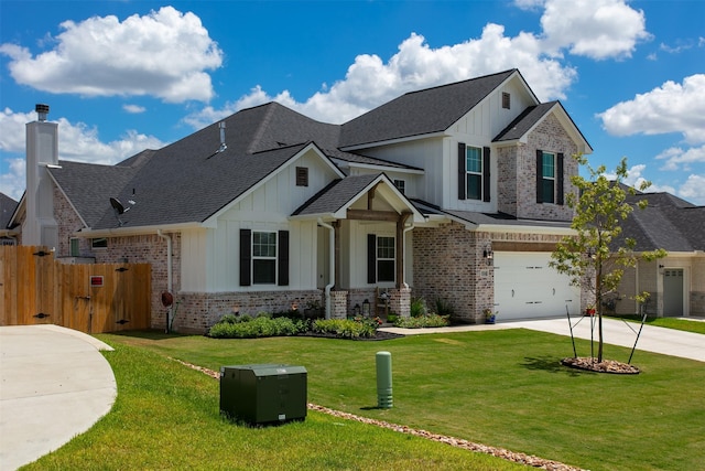 view of front facade featuring a garage and a front lawn