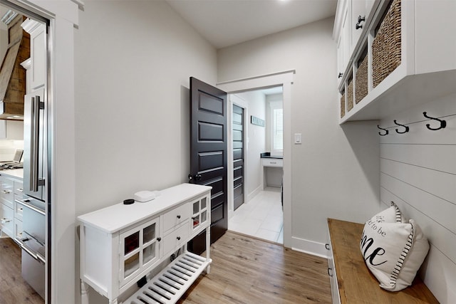 mudroom featuring light wood-type flooring