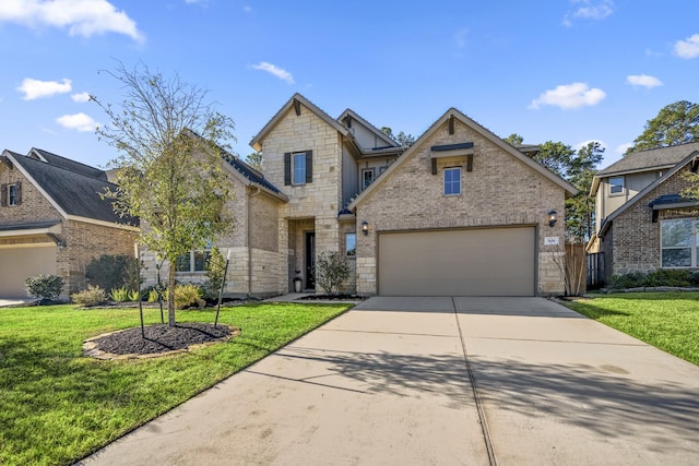 view of front of house with a garage and a front lawn