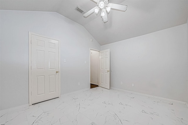 unfurnished bedroom with ceiling fan and vaulted ceiling