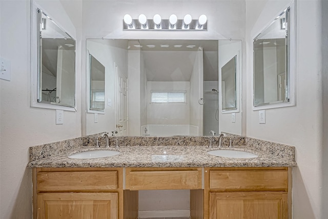 bathroom with separate shower and tub and vanity