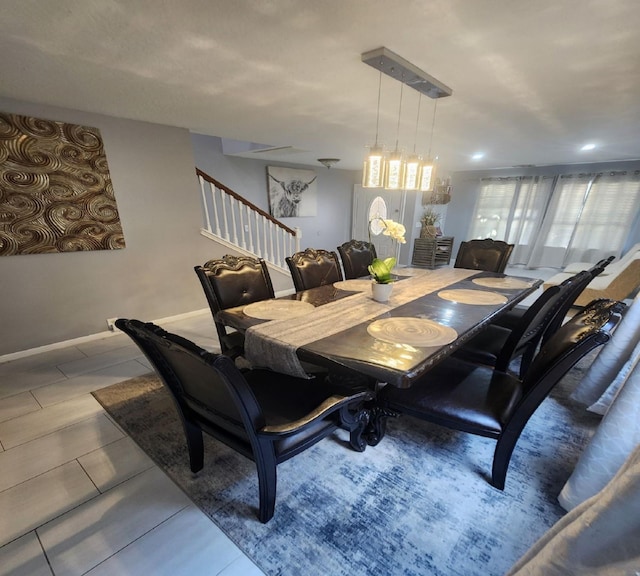 dining area featuring tile patterned floors