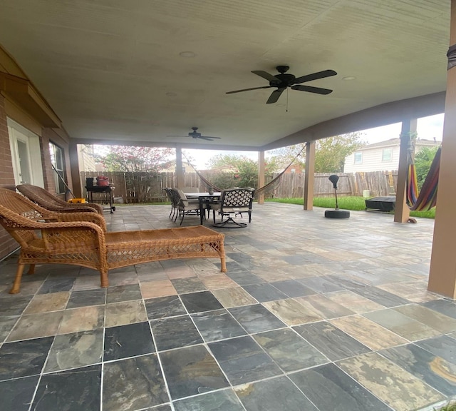 view of patio / terrace featuring ceiling fan