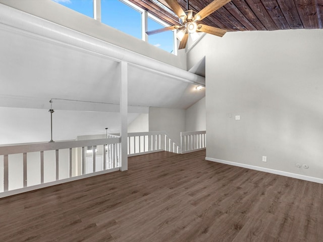 bonus room with ceiling fan, dark hardwood / wood-style floors, and vaulted ceiling