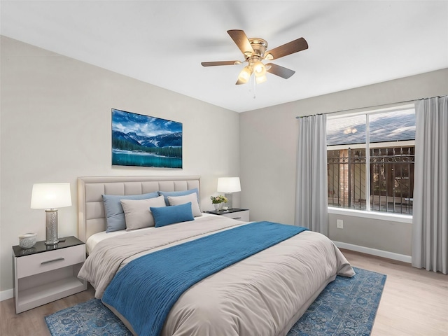 bedroom featuring ceiling fan and light hardwood / wood-style floors