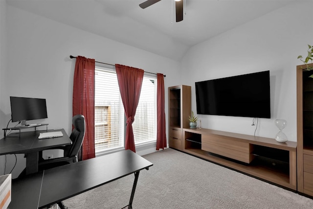 office with carpet flooring, ceiling fan, and vaulted ceiling