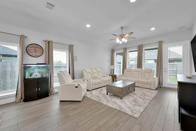 unfurnished living room featuring ceiling fan