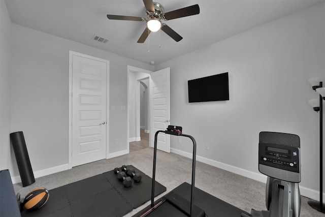 exercise room featuring carpet flooring and ceiling fan