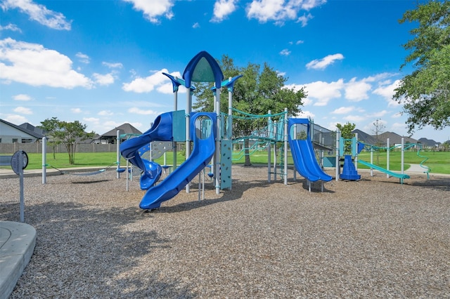 view of play area featuring a lawn