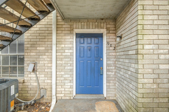9797 Leawood Blvd Unit 903, Houston, TX 77099 - property entrance with central AC unit and brick siding