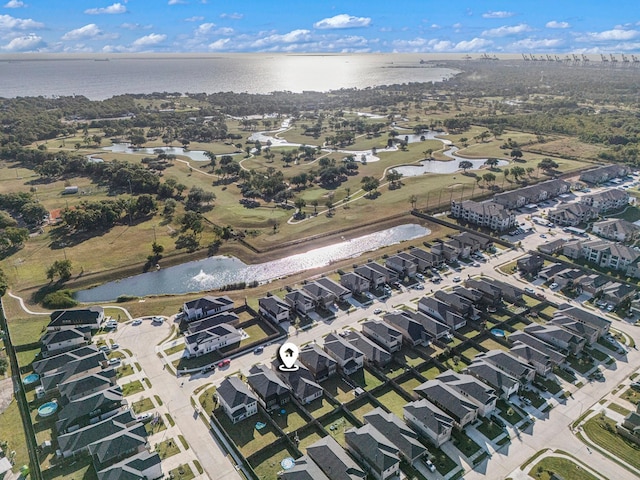 birds eye view of property with a residential view and a water view