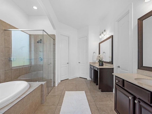 bathroom with vanity, tile patterned floors, and separate shower and tub