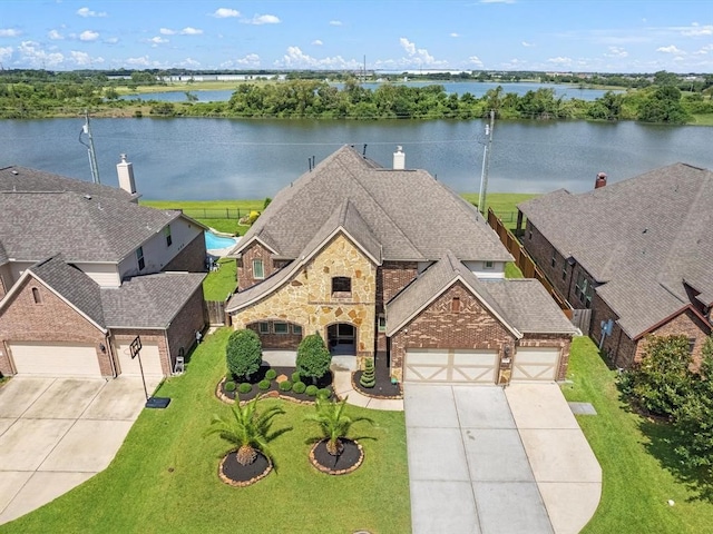 aerial view featuring a water view