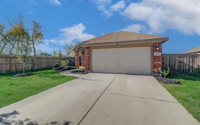 garage with a yard