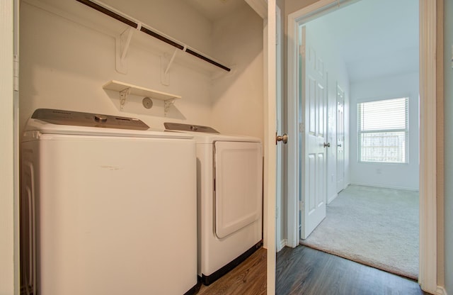 laundry area featuring dark colored carpet and independent washer and dryer