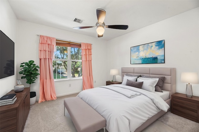 bedroom with light carpet and ceiling fan